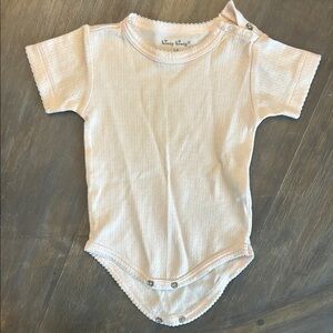 Light pink kissy kissy bodysuit